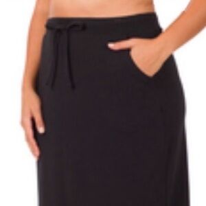 Midi Tulip Hem Skirt with pockets.